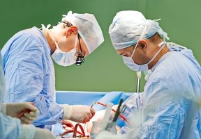 Medical Professionals Doctors Performing Surgery