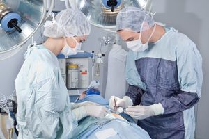 Doctors performing Maxillofacial surgery